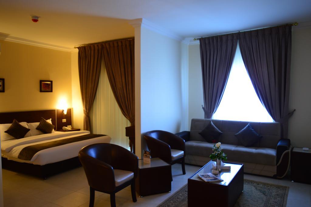 Ream Hotel Amán Habitación foto