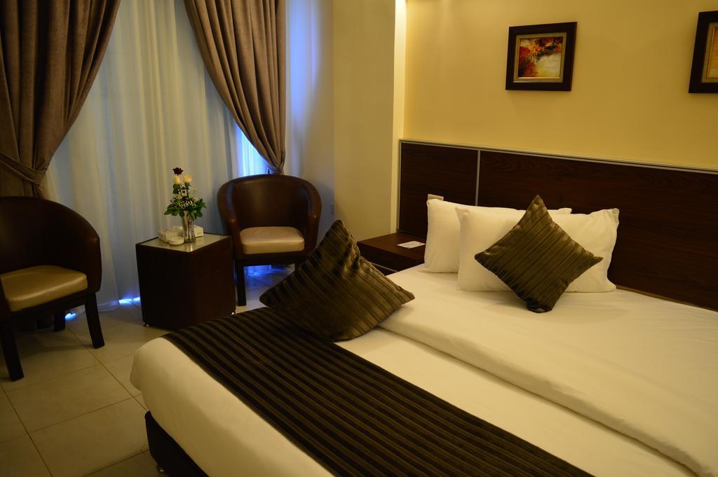 Ream Hotel Amán Habitación foto