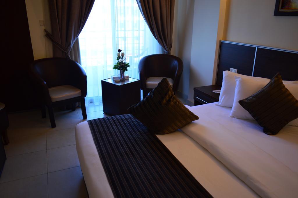 Ream Hotel Amán Habitación foto