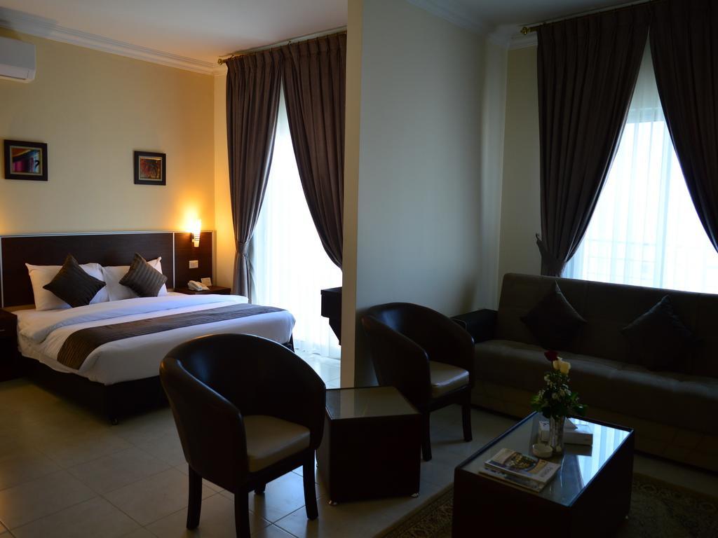 Ream Hotel Amán Habitación foto